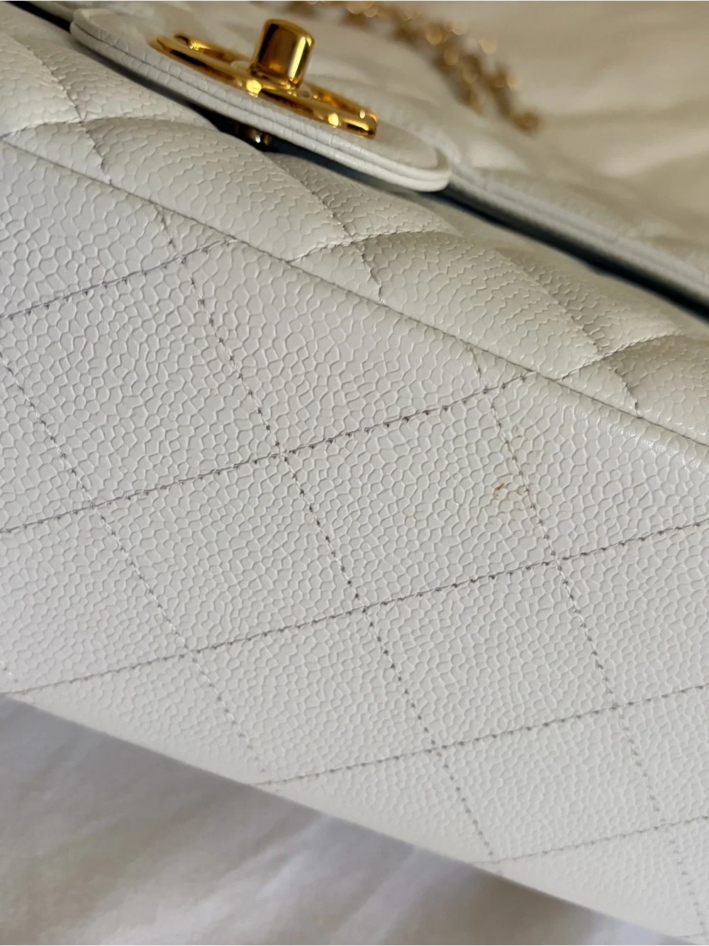 Chanel Maxi Classic Flap – White Caviar Leather & Gold Hardware